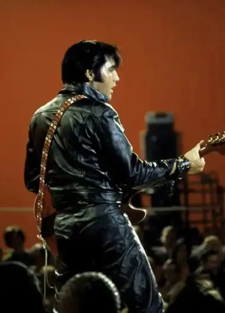 elvis-presley-black-leather-suit.webp