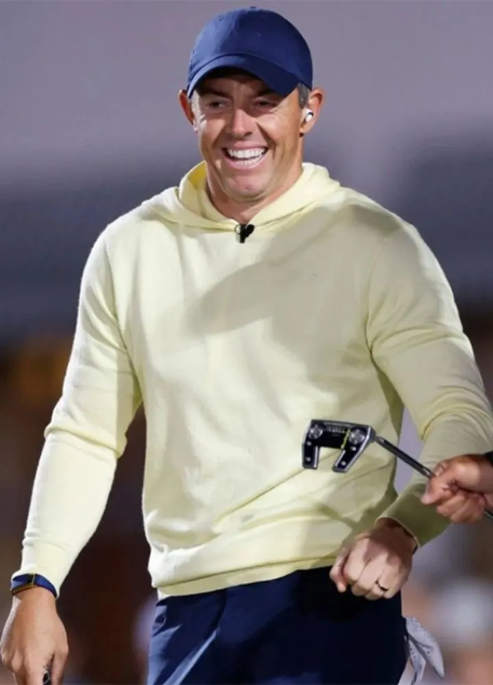 rory-mcilroy-golf-yellow-hoodie.webp