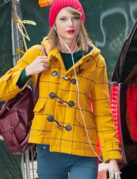 taylor-swift-paddington-bear-yellow-coat.webp