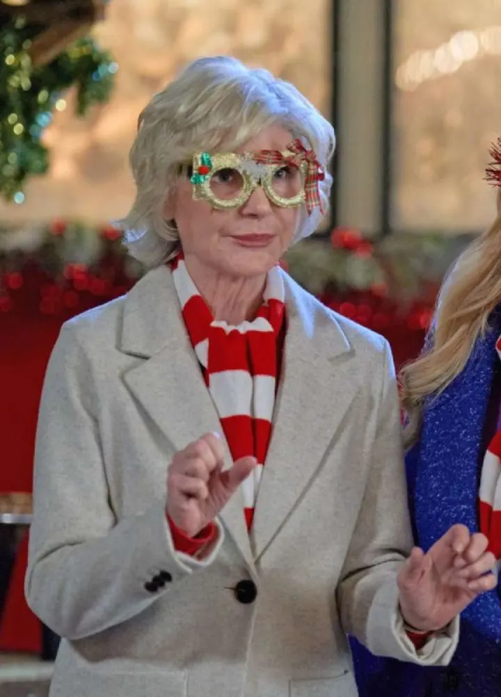 holiday-mismatch-2024-beth-broderick-coat.webp