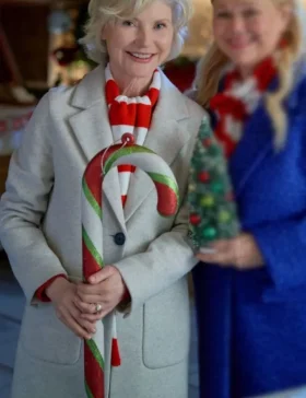 holiday-mismatch-2024-beth-broderick-long-coat.webp