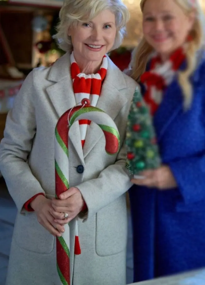 holiday-mismatch-2024-beth-broderick-long-coat.webp