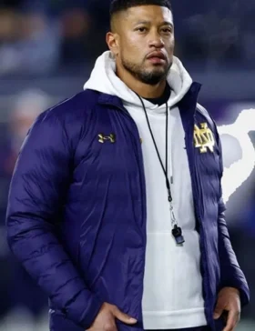 marcus-freeman-navy-notre-dame-puffer-jacket.webp