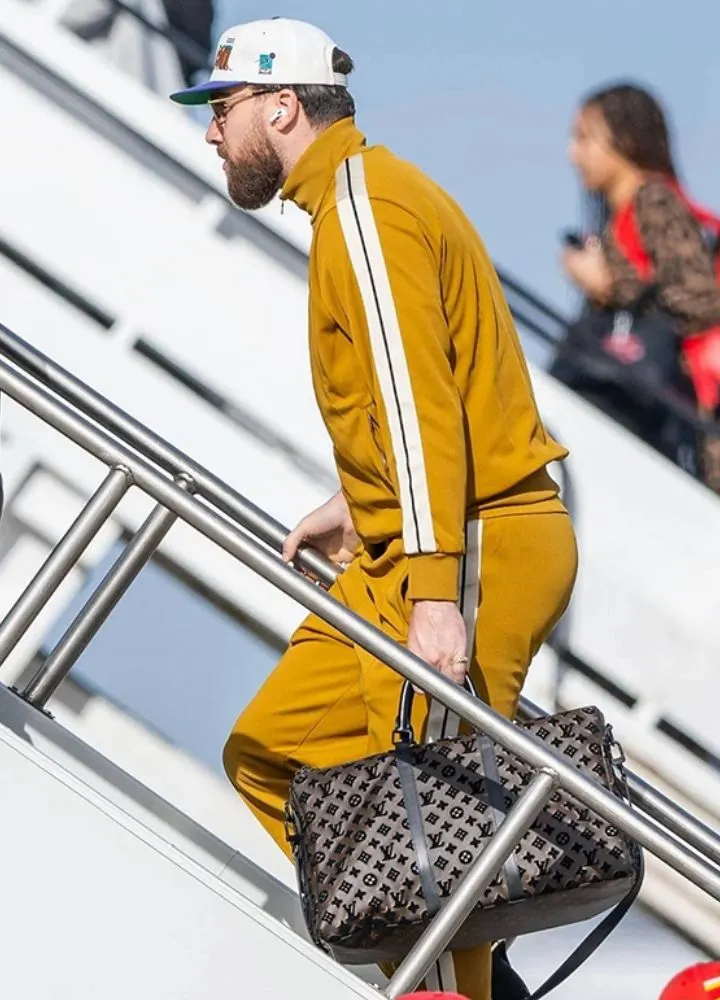 super-bowl-lix-travis-kelce-striped-mustard-jacket.webp