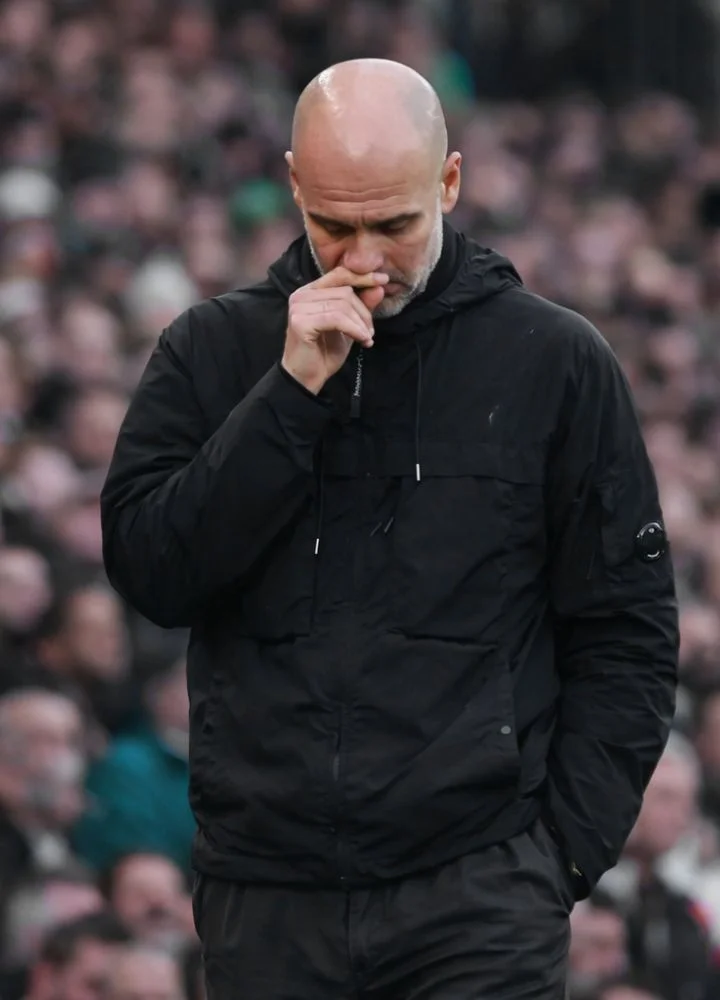 manager-pep-guardiola-black-jacket.webp